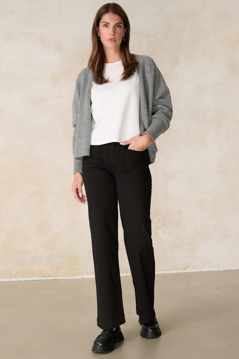 Clara – Flared trousers in bright black with a high waist